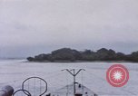 Image of American submarine waits in bay for commandos Pacific Theater, 1944, second 23 stock footage video 65675076122