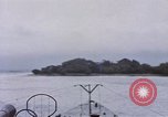 Image of American submarine waits in bay for commandos Pacific Theater, 1944, second 24 stock footage video 65675076122