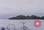 Image of American submarine waits in bay for commandos Pacific Theater, 1944, second 25 stock footage video 65675076122