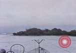 Image of American submarine waits in bay for commandos Pacific Theater, 1944, second 30 stock footage video 65675076122