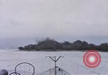 Image of American submarine waits in bay for commandos Pacific Theater, 1944, second 31 stock footage video 65675076122