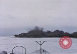 Image of American submarine waits in bay for commandos Pacific Theater, 1944, second 33 stock footage video 65675076122
