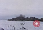 Image of American submarine waits in bay for commandos Pacific Theater, 1944, second 34 stock footage video 65675076122