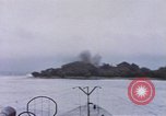 Image of American submarine waits in bay for commandos Pacific Theater, 1944, second 35 stock footage video 65675076122