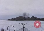 Image of American submarine waits in bay for commandos Pacific Theater, 1944, second 38 stock footage video 65675076122