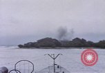 Image of American submarine waits in bay for commandos Pacific Theater, 1944, second 41 stock footage video 65675076122