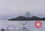 Image of American submarine waits in bay for commandos Pacific Theater, 1944, second 42 stock footage video 65675076122