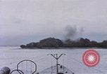 Image of American submarine waits in bay for commandos Pacific Theater, 1944, second 44 stock footage video 65675076122
