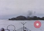 Image of American submarine waits in bay for commandos Pacific Theater, 1944, second 45 stock footage video 65675076122