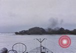 Image of American submarine waits in bay for commandos Pacific Theater, 1944, second 46 stock footage video 65675076122