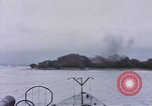 Image of American submarine waits in bay for commandos Pacific Theater, 1944, second 48 stock footage video 65675076122