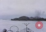 Image of American submarine waits in bay for commandos Pacific Theater, 1944, second 50 stock footage video 65675076122