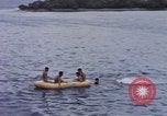 Image of American submarine waits in bay for commandos Pacific Theater, 1944, second 54 stock footage video 65675076122