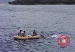 Image of American submarine waits in bay for commandos Pacific Theater, 1944, second 55 stock footage video 65675076122