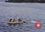 Image of American submarine waits in bay for commandos Pacific Theater, 1944, second 58 stock footage video 65675076122