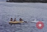 Image of American submarine waits in bay for commandos Pacific Theater, 1944, second 59 stock footage video 65675076122