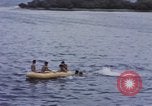 Image of American submarine waits in bay for commandos Pacific Theater, 1944, second 60 stock footage video 65675076122