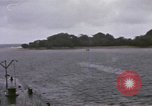Image of American submarine waits in bay for commandos Pacific Theater, 1944, second 61 stock footage video 65675076122