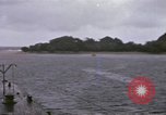 Image of American submarine waits in bay for commandos Pacific Theater, 1944, second 62 stock footage video 65675076122