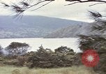 Image of US commandos set explosives on island Pacific Theater, 1944, second 5 stock footage video 65675076123
