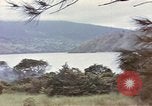 Image of US commandos set explosives on island Pacific Theater, 1944, second 7 stock footage video 65675076123