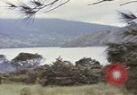 Image of US commandos set explosives on island Pacific Theater, 1944, second 8 stock footage video 65675076123