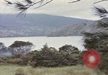 Image of US commandos set explosives on island Pacific Theater, 1944, second 9 stock footage video 65675076123