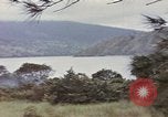 Image of US commandos set explosives on island Pacific Theater, 1944, second 10 stock footage video 65675076123