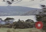 Image of US commandos set explosives on island Pacific Theater, 1944, second 12 stock footage video 65675076123