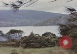 Image of US commandos set explosives on island Pacific Theater, 1944, second 13 stock footage video 65675076123