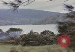 Image of US commandos set explosives on island Pacific Theater, 1944, second 16 stock footage video 65675076123