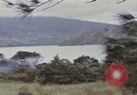 Image of US commandos set explosives on island Pacific Theater, 1944, second 17 stock footage video 65675076123