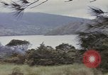 Image of US commandos set explosives on island Pacific Theater, 1944, second 19 stock footage video 65675076123