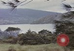 Image of US commandos set explosives on island Pacific Theater, 1944, second 20 stock footage video 65675076123