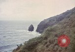Image of US commandos set explosives on island Pacific Theater, 1944, second 21 stock footage video 65675076123