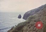 Image of US commandos set explosives on island Pacific Theater, 1944, second 22 stock footage video 65675076123