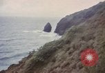 Image of US commandos set explosives on island Pacific Theater, 1944, second 23 stock footage video 65675076123