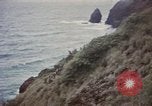 Image of US commandos set explosives on island Pacific Theater, 1944, second 24 stock footage video 65675076123