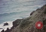 Image of US commandos set explosives on island Pacific Theater, 1944, second 26 stock footage video 65675076123