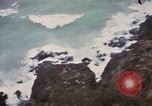 Image of US commandos set explosives on island Pacific Theater, 1944, second 29 stock footage video 65675076123