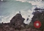 Image of US commandos set explosives on island Pacific Theater, 1944, second 31 stock footage video 65675076123
