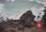 Image of US commandos set explosives on island Pacific Theater, 1944, second 32 stock footage video 65675076123