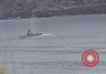 Image of US commandos set explosives on island Pacific Theater, 1944, second 45 stock footage video 65675076123