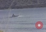 Image of US commandos set explosives on island Pacific Theater, 1944, second 46 stock footage video 65675076123