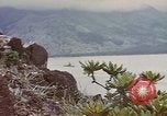 Image of US commandos set explosives on island Pacific Theater, 1944, second 49 stock footage video 65675076123