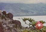 Image of US commandos set explosives on island Pacific Theater, 1944, second 50 stock footage video 65675076123