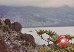 Image of US commandos set explosives on island Pacific Theater, 1944, second 53 stock footage video 65675076123
