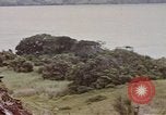 Image of US commandos set explosives on island Pacific Theater, 1944, second 59 stock footage video 65675076123