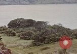 Image of US commandos set explosives on island Pacific Theater, 1944, second 60 stock footage video 65675076123