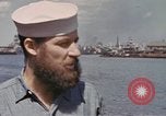 Image of US submarine crews and Japanese POWs disembarking Pearl Harbor Hawaii USA, 1944, second 4 stock footage video 65675076128